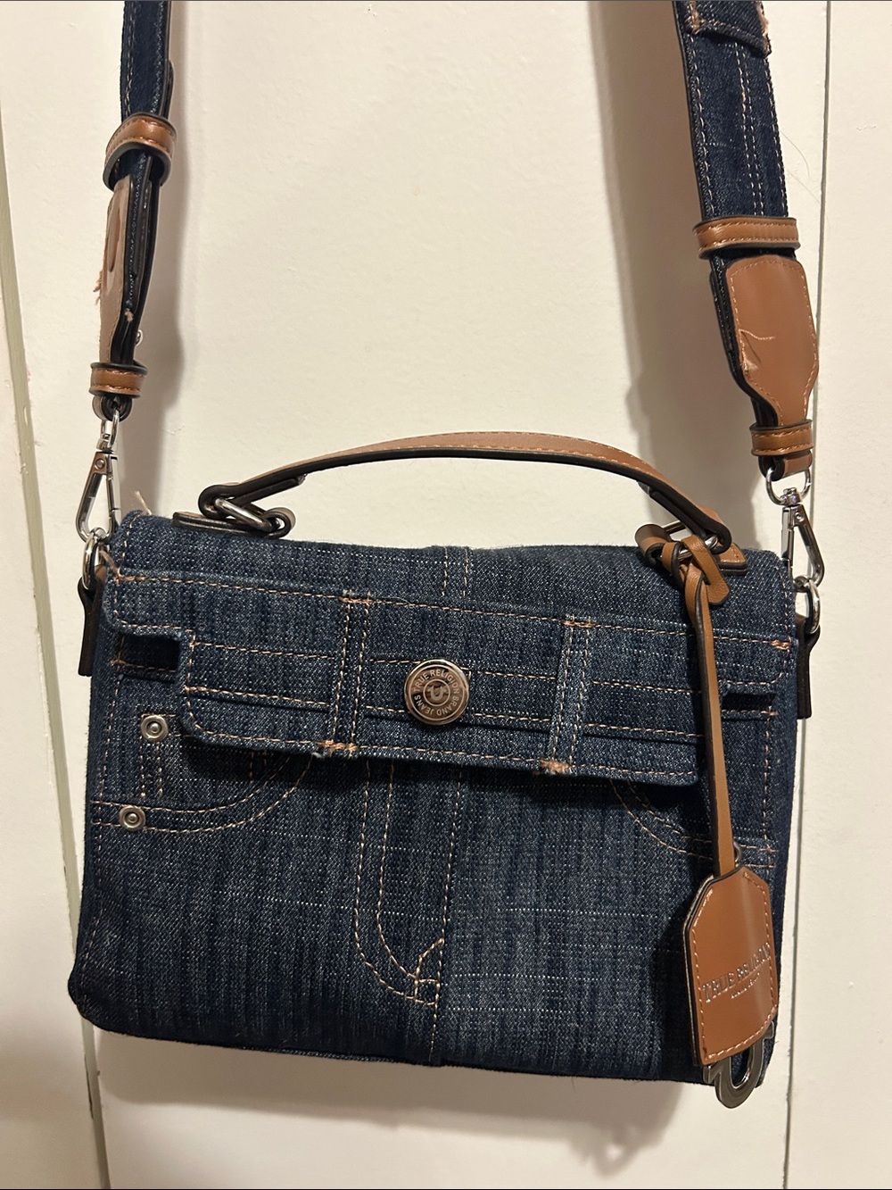 True Religion Dark Denim Crossbody with Tan Trim